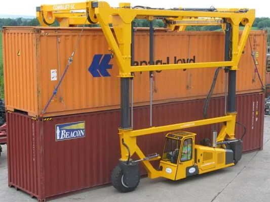 Combilift straddle carrier handling containers