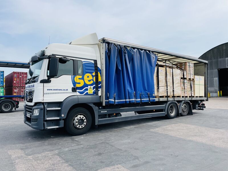 Curtainside vehicle loaded with palletised goods